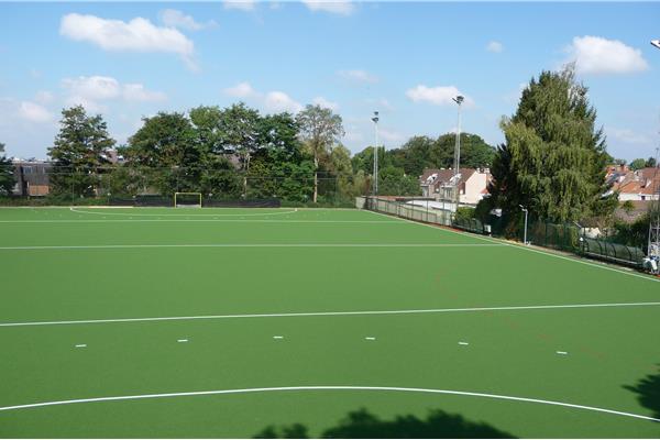 Renovatie kunstgras hockeyveld - Sportinfrabouw NV